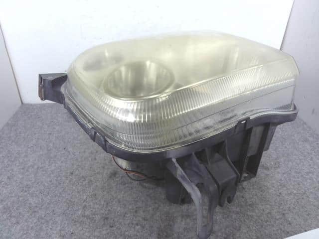 Left Headlight SUZUKI Lapin 2005 CBA-HE21S 3532075H02 — photo 6