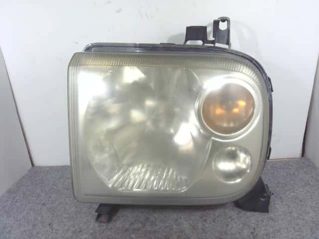 Left Headlight SUZUKI Lapin 2005 CBA-HE21S 3532075H02 — photo 1