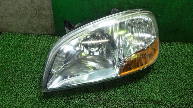 Left Headlight SUZUKI Swift 2000 GH-HT51S 3532080G10 — photo 1