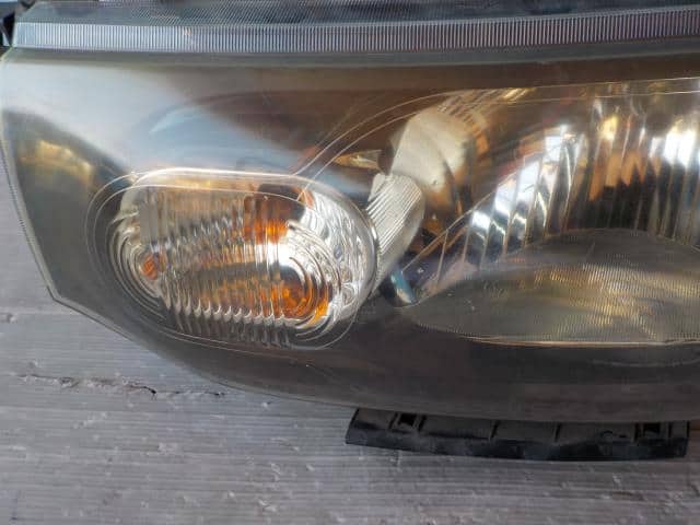 Left Headlight NISSAN Cube 2009 DBA-Z12 — photo 2