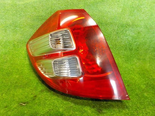 Left Tail Light HONDA Fit 2009 DBA-GE6 — photo 1