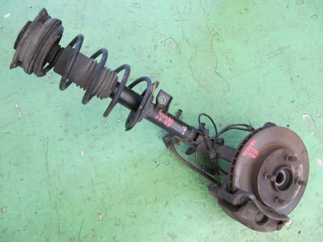 Front Left Strut NISSAN Note 2005 DBA-E11 — photo 1
