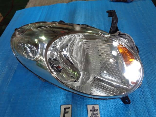 Left Headlight NISSAN March 2007 DBA-AK12 — photo 1