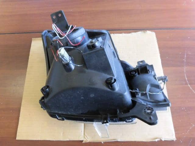 Left Headlight SUZUKI Alto 2005 GBD-HA24V — photo 2