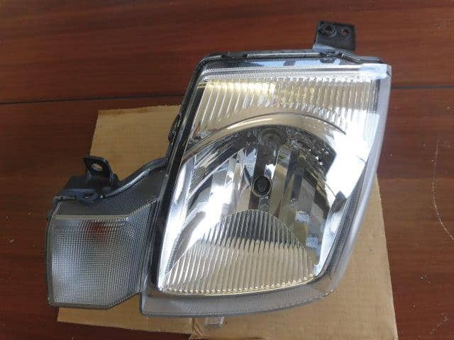 Left Headlight SUZUKI Alto 2005 GBD-HA24V — photo 1