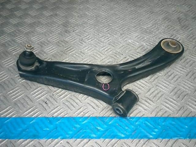 Front Right Lower Control Arm SUZUKI Lapin 2015 DBA-HE22S 4520185K11 — photo 1