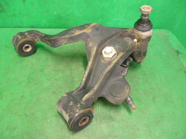 Front Left Lower Control Arm NISSAN Atlas 2011 BKG-AMR85AN — photo 1