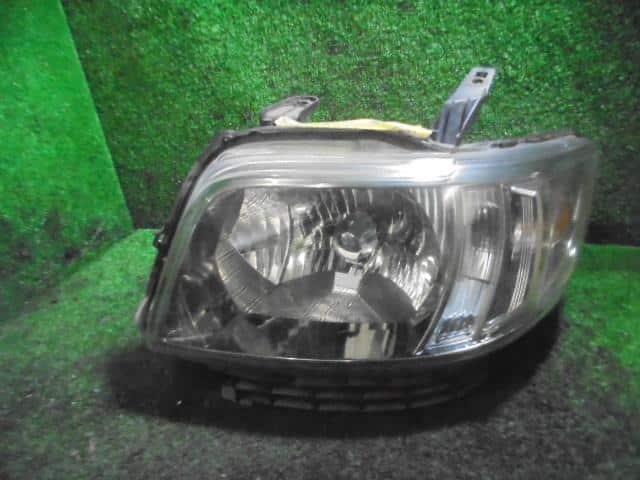 Left Headlight HONDA Zest 2007 DBA-JE1 — photo 1