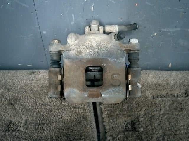 Front Left Caliper SUZUKI Lapin 2005 ABA-HE21S 5510273H01999 — photo 1