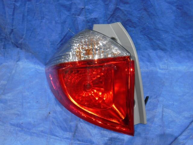 Left Tail Light TOYOTA Ractis 2011 DBA-NSP120 — photo 1