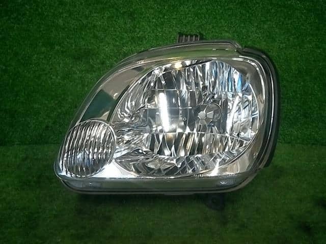Left Headlight SUBARU Pleo 2009 EBD-RV1 — photo 1