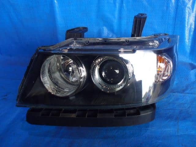 Left Headlight HONDA Zest 2010 DBA-JE1 — photo 1