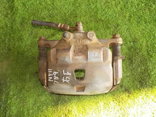 Front Right Caliper NISSAN Wingroad 2005 UA-WHNY11 410014M400 — photo 1