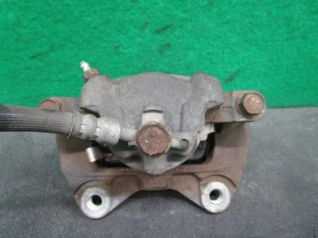 Front Left Caliper TOYOTA Passo 2006 DBA-KGC10 — photo 3