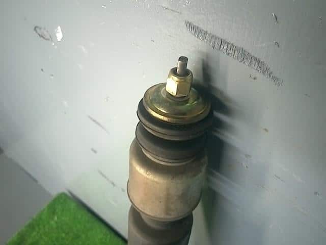 Rear Left Shock Absorber NISSAN March 2004 UA-AK12 — photo 2