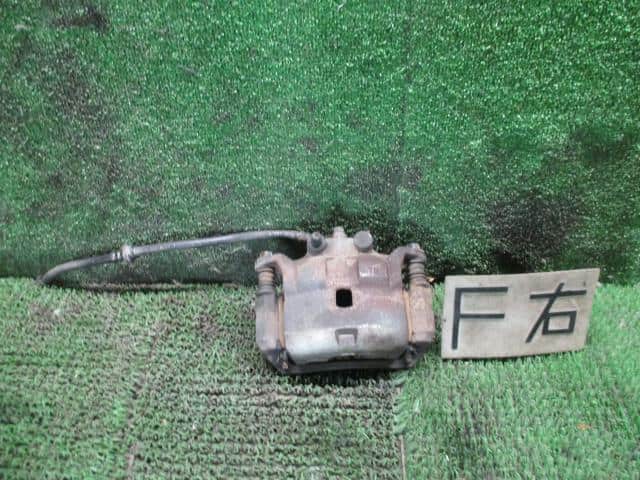 Front Right Caliper NISSAN Cube 2011 DBA-NZ12 — photo 1