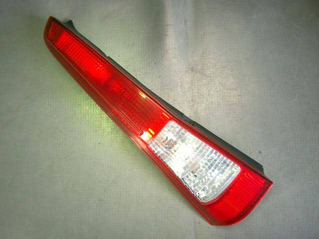 Left Tail Light DAIHATSU Mira 2006 LE-L250V — photo 1