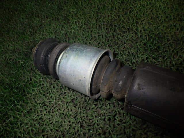 Rear Left Shock Absorber NISSAN March 2007 DBA-AK12 — photo 3