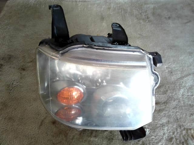 Right Headlight MITSUBISHI Toppo 2009 DBA-H82A — photo 1