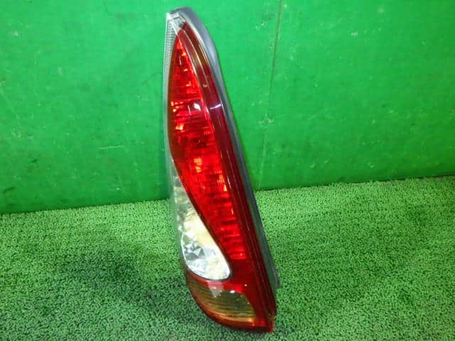 Left Tail Light TOYOTA Fun Cargo 2003 UA-NCP20 8156152330 — photo 1