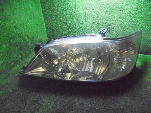 Left Headlight TOYOTA Vista 2002 TA-AZV50 — photo 1