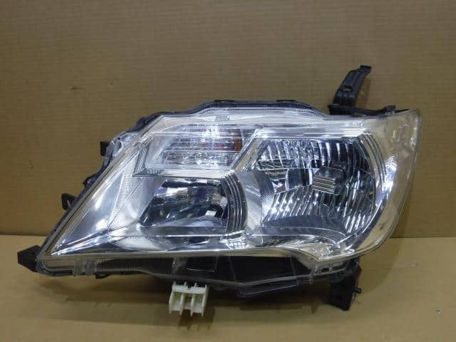 Left Headlight NISSAN Serena 2013 DBA-FNC26 — photo 1