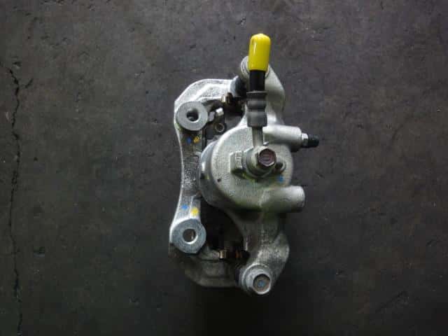 Front Left Caliper NISSAN March 2013 DBA-K13 — photo 2