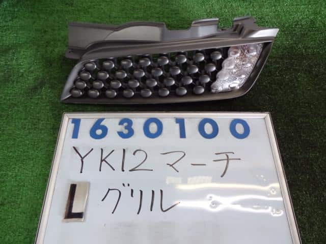 Radiator Grille NISSAN March 2006 DBA-YK12 — photo 1