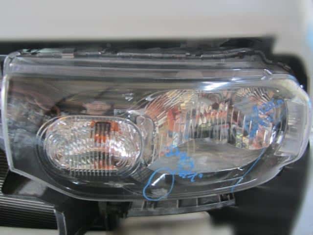 Left Headlight NISSAN Cube 2009 DBA-Z12 — photo 1