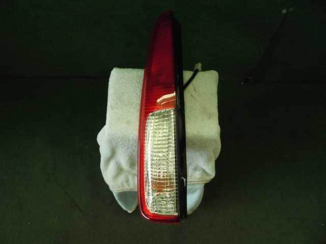 Left Tail Light DAIHATSU Move 2001 UA-L900S — photo 1