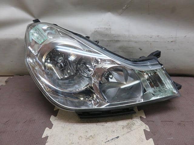Right Headlight NISSAN Wingroad 2006 DBA-NY12 — photo 1