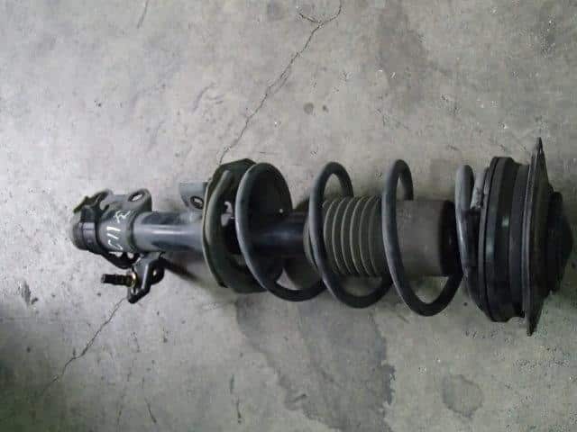 Front Left Strut NISSAN Tiida 2005 DBA-C11 — photo 1