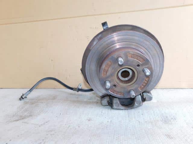 Front Left Knuckle Hub Assembly MAZDA Spiano 2002 LA-HF21S 1A1333031 — photo 1