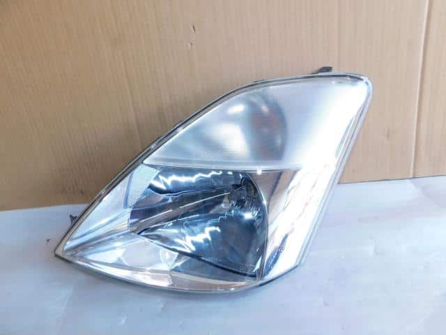 Left Headlight NISSAN Moco 2004 CBA-MG21 — photo 1