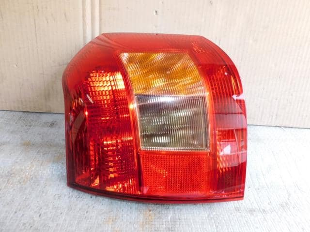 Left Tail Light TOYOTA Allex 2002 TA-NZE121 — photo 1