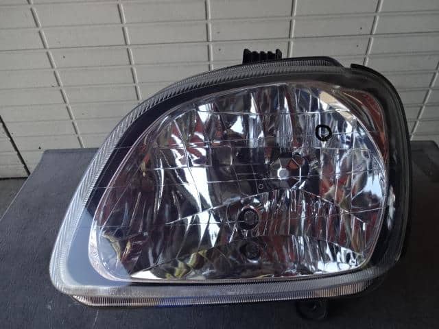 Left Headlight SUBARU Pleo 2003 LE-RV1 — photo 1