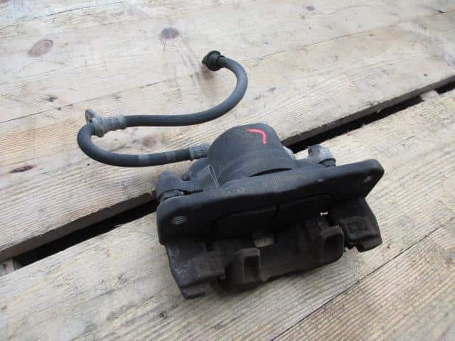 Front Left Caliper HONDA Life 1998 GF-JB1 — photo 1