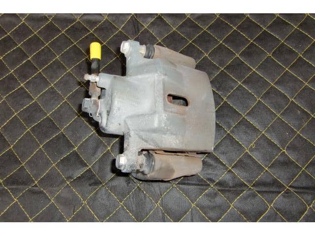 Front Left Caliper TOYOTA Celica 2004 TA-ZZT230 — photo 1