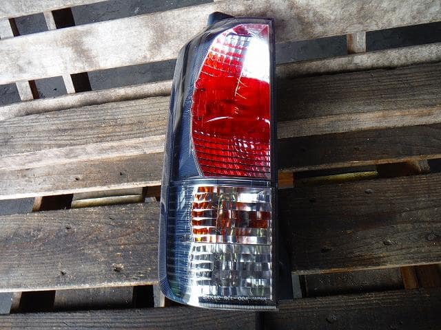 Left Tail Light MITSUBISHI eK Sport 2004 UA-H81W — photo 1
