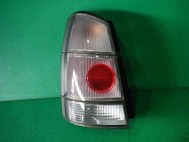 Left Tail Light SUBARU Pleo 2002 TA-RA1 84201KE070 — photo 1