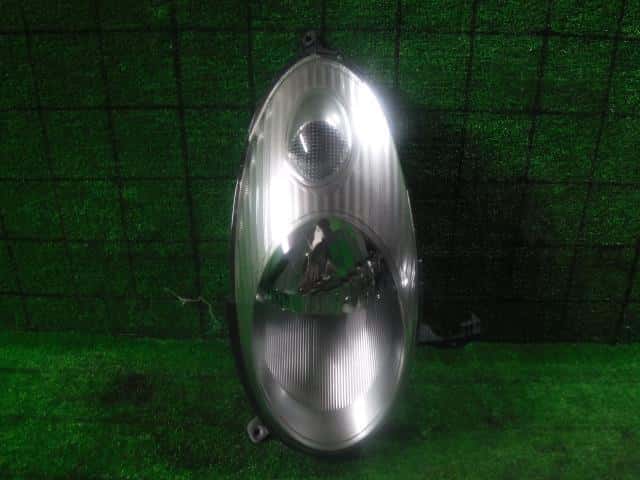 Left Headlight NISSAN March 2002 UA-BNK12 — photo 1