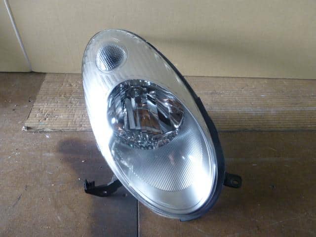 Right Headlight NISSAN March 2005 CBA-AK12 — photo 1