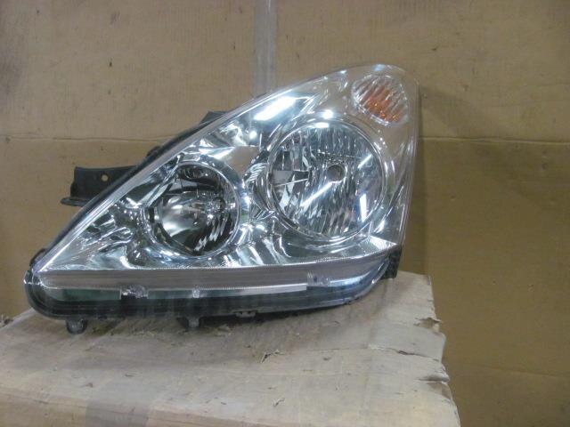 Left Headlight TOYOTA Wish 2003 UA-ZNE10 — photo 1