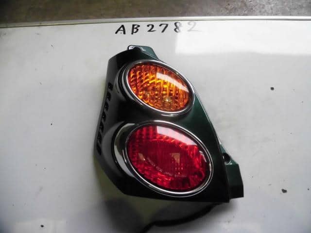 Left Tail Light MITSUBISHI Minica 2004 GF-H42A — photo 1