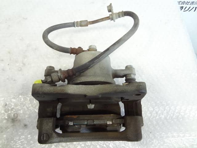 Front Left Caliper TOYOTA Aqua 2011 DAA-NHP10 — photo 1