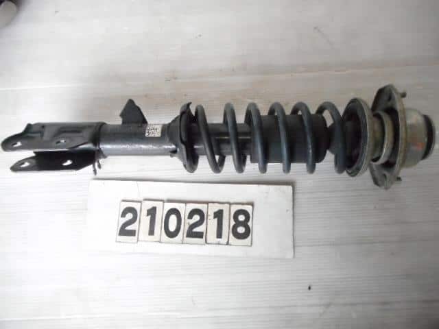 Front Left Strut SUBARU Stella 2008 DBA-RN1 20310KG070 — photo 1