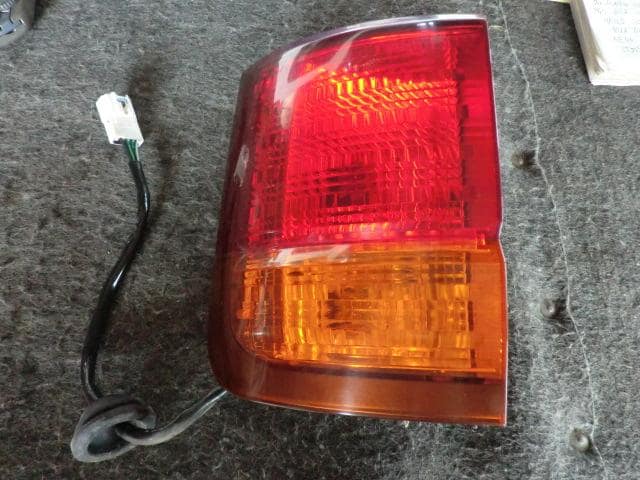 Left Tail Light NISSAN Elgrand 1999 E-ALWE50 — photo 1