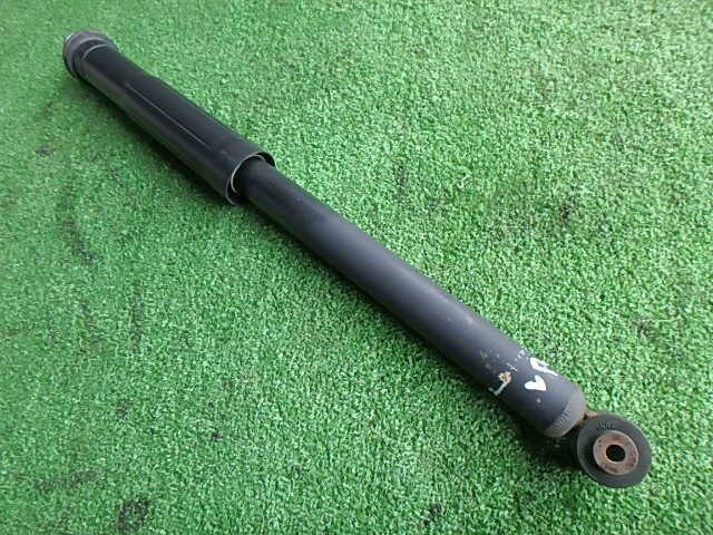 Rear Left Shock Absorber TOYOTA Vitz 2006 DBA-SCP90 — photo 1