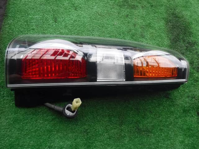 Left Tail Light SUZUKI Wagon R 2003 UA-MH21S 3567058J10 — photo 1