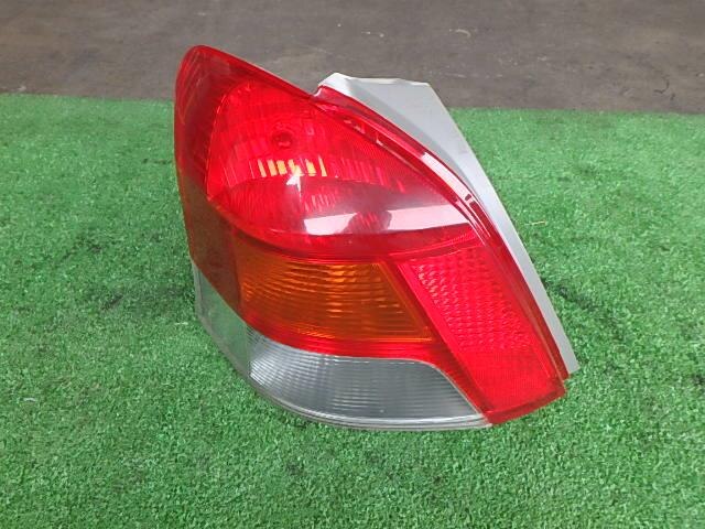 Left Tail Light TOYOTA Vitz 2009 CBA-NCP95 — photo 1